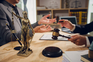 Businessmen consult with lawyers, submit additional documents, and pay for lawyers' services. After...