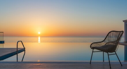 Serene Sunset Over Ocean with Poolside Chair and Calm Waterscape