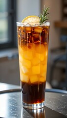 Iced Honey Lemon Black Coffee in Tall Clear Cup with Lemon and Rosemary Garnish