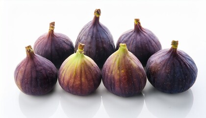 Fototapeta premium seven figs arranged on a surface isolated on white background
