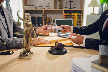 Businessmen consult with lawyers, submit additional documents, and pay for lawyers' services. After...