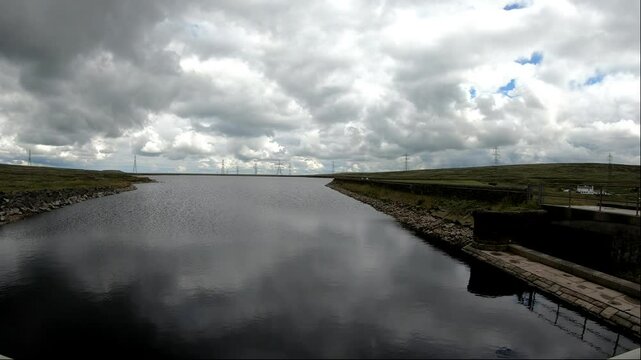 View of the Blackstone Edge Reservoir as rain clouds start to form.
