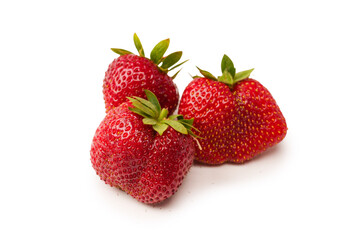 Fresh group of berries isolated on a white background.