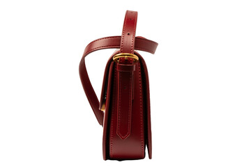 Burgundy shoulder leather bag isolated on white background.