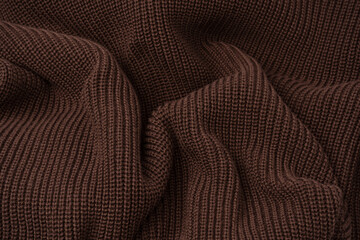 Fototapeta premium Brown sweater texture as a background.