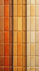 Three columns of textured rectangular tiles in warm shades of brown orange and beige