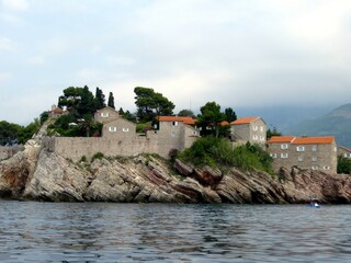 Stunning View of Sveti Stefan Island Resort in Montenegro Surrounded by Crystal Clear Waters