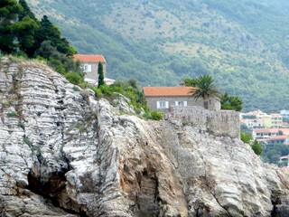 Discover Beautiful Views of Montenegros Sveti Stefan Island Resort and Its Historic Coastline