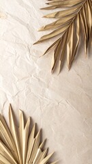 Dried Gold Palm Leaves on Beige Textured Background