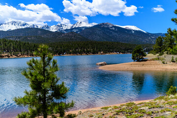 Crystal Creek reservoir near snow-capped mountains Pikes Peak Mountains in Colorado Spring, USA