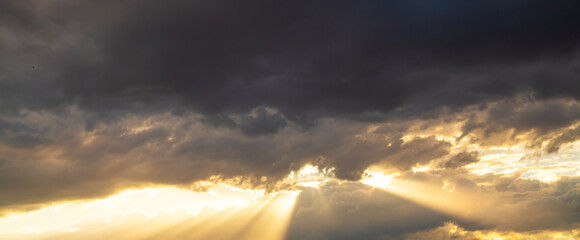 Beautiful bright sunset sky background with clouds.  Evening time.