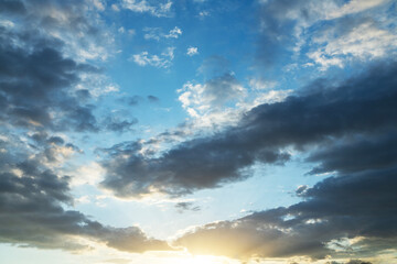 Beautiful sunset  with evening clouds on dramatic sky.