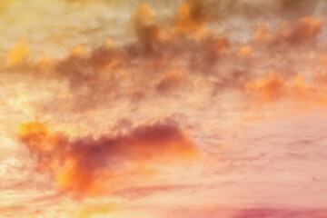 Incredibly beautiful and colorful clouds photographed at dawn. Amazing colors of nature, soft focus