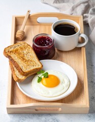 Sunny Side Up Egg with Toast Jam and Coffee Breakfast