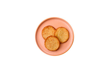 Hash browns, a breakfast food made of potatoes, onions and vegetables. Hash browns with potatoes