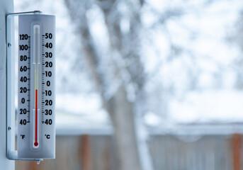 A thermometer is showing a temperature of 50 degrees