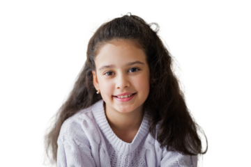 Young girl smiling warmly, showcasing joy and innocence a cheerful moment transparent background