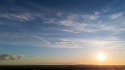 Stunning sunset landscape with vivid colors and dramatic clouds, showcasing the beauty of nature....