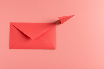 Paper Plane and Envelope on Pink Background