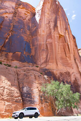 High canyon walls along the Potash Road along the Colorado River near Moab, Utah, USA known for the petroglyphs higher up on the cliff face