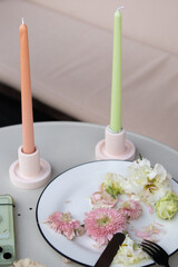 Elegant dining table with stylish candles 