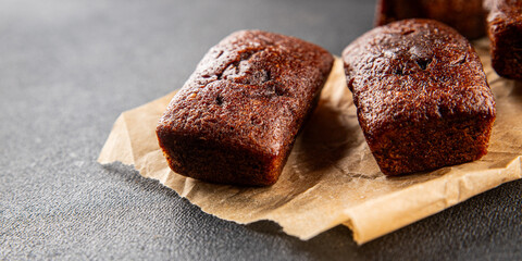 Financier biscuit chocolate cookie sweet dessert fresh delicious gourmet food background on the table rustic food top view copy space