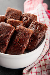 Financier biscuit chocolate cookie sweet dessert fresh delicious gourmet food background on the table rustic food top view copy space