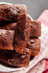 Financier biscuit chocolate cookie sweet dessert fresh delicious gourmet food background on the table rustic food top view copy space