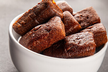 Financier biscuit chocolate cookie sweet dessert fresh delicious gourmet food background on the table rustic food top view copy space