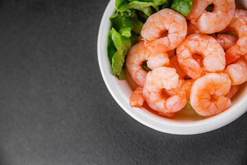 Shrimp salad prawns seafood fresh pescetarian diet gourmet food background on the table rustic food top view copy space keto and paleo diet vegetarian food