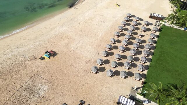 Drone point of view at Nico beach at sunny day. Perfect holiday location.Nusa Dua.Bali