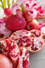 Pomegranate and Flowers Arrangement with Vibrant Colors