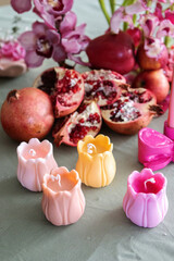 Handmade Candles, Peonies & Pomegranate on Festive Table