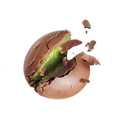 Broken chocolate candy with green creamy filling isolated on white background