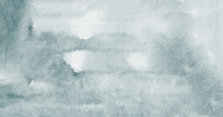 Soft abstract watercolor background in pale green-blue tones, resembling mist or fog. Subtle...