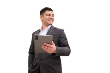 Professional man holds tablet confidently outdoors, showcasing modern technology in a isolated transparent background