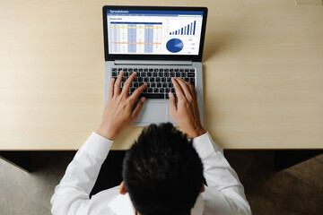 Spreadsheet document information financial startup concept. data and graphs in spreadsheet...