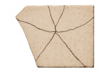 Close-up of a broken, cracked, and weathered ceramic tile isolated on a transparent background, showcasing its aged and damaged condition