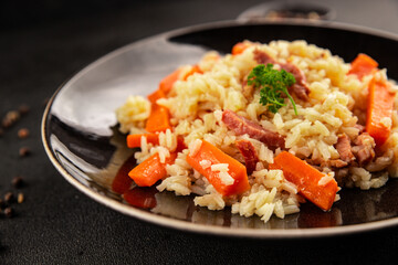 Rice meat and vegetables pilaf fresh delicious gourmet food background on the table rustic food top view copy space