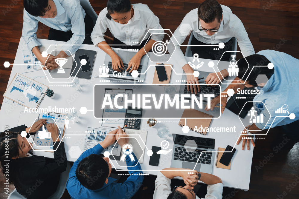 Aufkleber Aerial view of a diverse team collaborating in a modern office, focusing on business achievement and success while utilizing technology and communication tools. Amity