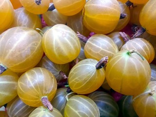Freshly Harvested Gooseberry Berries Nestled Together in a Vibrant Display at a Local Market