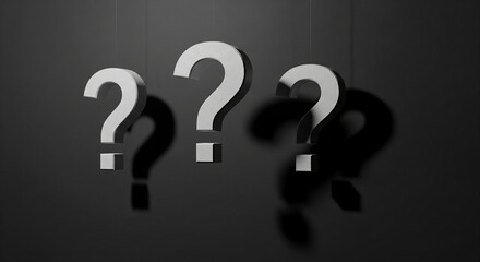 Three gray question marks hang against a dark background, casting shadows, symbolizing uncertainty, inquiry, or the search for answers