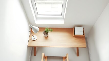 A minimalist wooden desk with a potted plant, reflecting Scandinavian-inspired simplicity and calm.