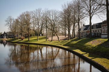 Scenic canal and historic bastion fortification in Dokkum, Friesland