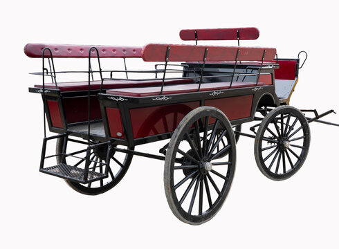 Buckboard wagon looks new outfitted with leather seating. Painted red maroon  with old wheels, back rests & railing it is ready for display or parade. Isolated and back step up visible.