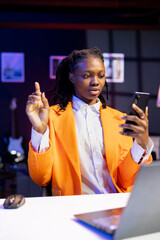 Young person checking up on close friends during phone video conference meeting over the internet....