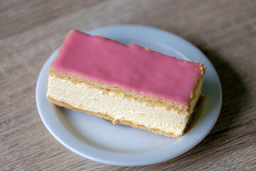 Selective focus of Tompouce with pink smooth icing, A tompoes is a pastry in the Netherlands and...