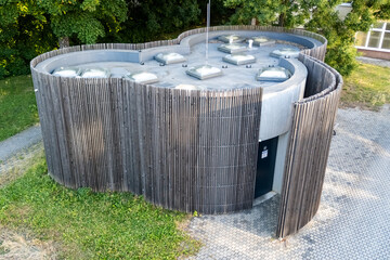 The building has organic shapes that completely contradict the conventional perception of public...