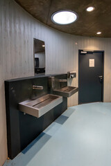 The building has organic shapes that completely contradict the conventional perception of public...