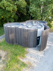 The building has organic shapes that completely contradict the conventional perception of public...